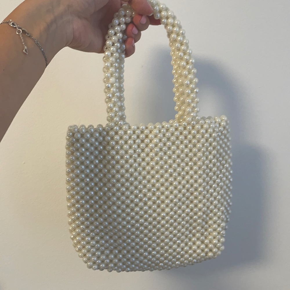 Skinnydip ‘Penelope’ faux pearl beaded handbag.